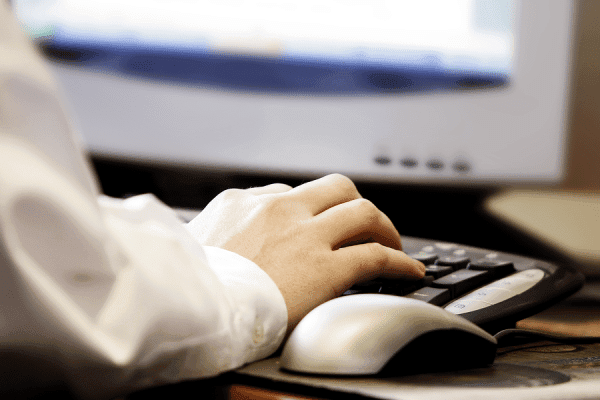 man on computer